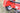 A rearview perspective of a red forecart, showing the inside of a square fender and a pneumatic tire and its left-hand mechanical disc brake assembly. Pneumatic tires allow for a more comfortable ride.